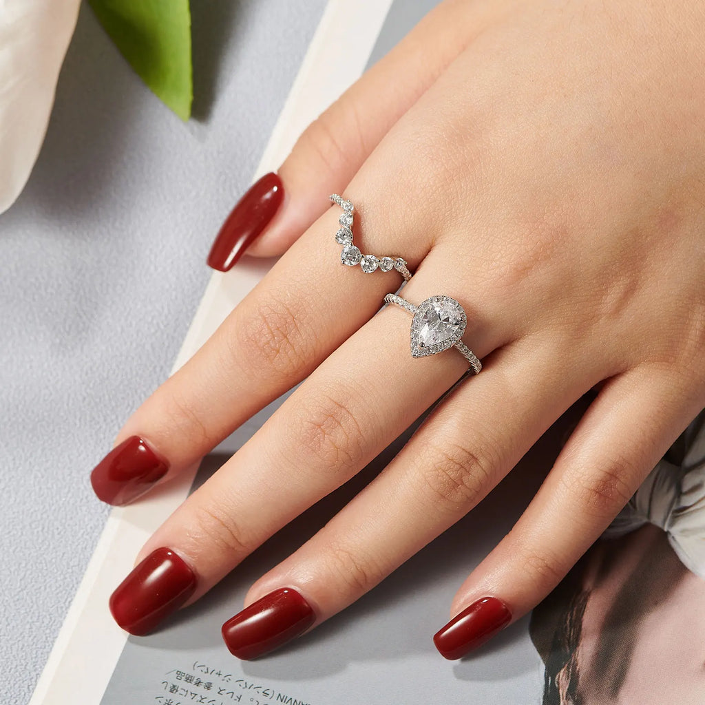 Newshe 1.5 Ct Halo Pear Cut 925 Silver Engagement Ring Set for Women Cambered Wedding Band High Grade Cz Luxury Bridal Jewelry